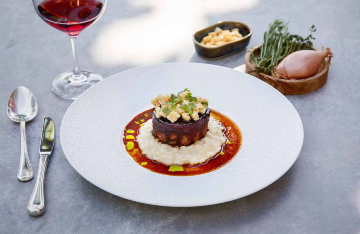 Ragoût de bœuf et sa sauce au vin rouge et risotto